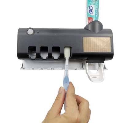 Da montagem sem fio da parede da esterilização suporte UV da escova de dentes com o suporte de copo da escova