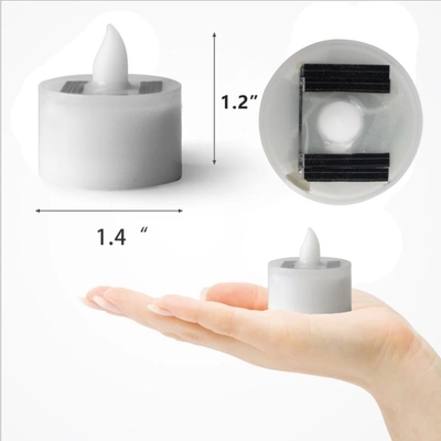 A vela posta solar Flameless do diodo emissor de luz ilumina luzes decorativas da atmosfera interna